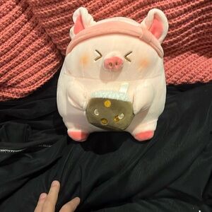 It’s a pig that has Boba in his hands with his eyes closed